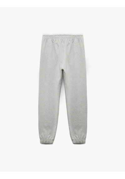Koton Şardonlu Beli Lastikli Cep Detaylı Rahat Kalıp Jogger Eşofman Altı Gri 6wal40021ık Gri Koton Şardonlu Beli Lastikli Cep Detaylı Rahat Kalıp Jogger Eşofman Altı Gri 6wal40021ık Gri
