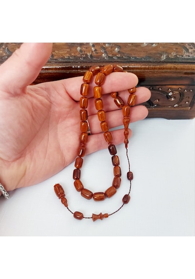 Muhammed Erden Usta Eseri Kapsül Kesim Hareli Kahverengi Sıkma Kehribar Tesbih... Ölçü: 8 X 12 Kahverengi