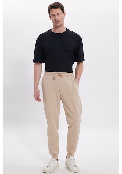 Tudors Erkek Regular Fit Klasik Kesim Beli Bağcıklı Jogger Cepli Lastikli Paça Bej Eşofman Altı-41767 Bej Tudors Erkek Regular Fit Klasik Kesim Beli Bağcıklı Jogger Cepli Lastikli Paça Bej Eşofman Altı-41767 Bej