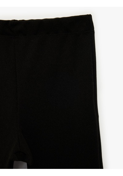 Koton Yırtmaç Detaylı Slim Fit İspanyol Paça Tayt Siyah 7wkg40173ak