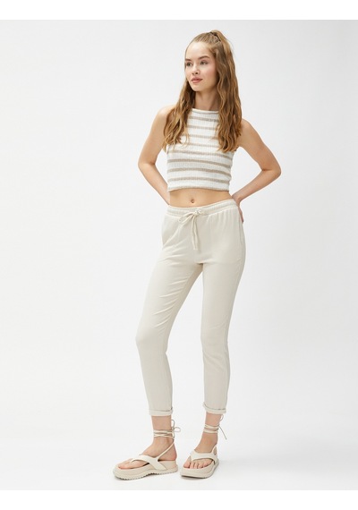 Koton Beli Bağcıklı Pantolon Dar Paça Rahat Kesim Dokulu Bej 3sal40083ık 3SAL40083IK051 Ekru Koton Beli Bağcıklı Pantolon Dar Paça Rahat Kesim Dokulu Bej 3sal40083ık 3SAL40083IK051 Ekru