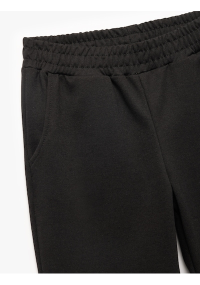 Koton Şardonlu Beli Lastikli Cep Detaylı Rahat Kalıp Jogger Eşofman Altı Siyah 6wal40021ık Siyah Koton Şardonlu Beli Lastikli Cep Detaylı Rahat Kalıp Jogger Eşofman Altı Siyah 6wal40021ık Siyah