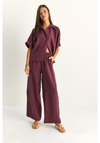 Shade Kadın Oversize Kısa Kol Gömlek Beli Lastikli Geniş Paça Pantolon Takım 7651 60286138 - Mürdüm Shade Kadın Oversize Kısa Kol Gömlek Beli Lastikli Geniş Paça Pantolon Takım 7651 60286138 - Mürdüm