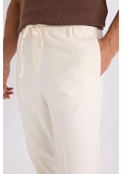 DeFacto Yazlık Kumaş Jogger Pantolon Beli Bağcıklı Lastikli Düz Paça Cepli Her Yöne Esneyen A9943AX25SPER140