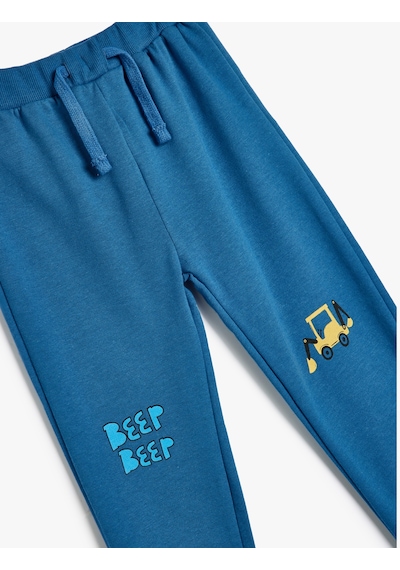 Koton Jogger Eşofman Altı Beli Bağlamalı Traktör Baskılı Pamuklu Şardonlu Saks 5wmb40063tk Saks Mavi Koton Jogger Eşofman Altı Beli Bağlamalı Traktör Baskılı Pamuklu Şardonlu Saks 5wmb40063tk Saks Mavi