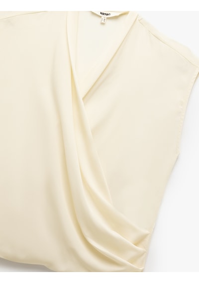 Koton Krep Kumaş Drape Detaylı Kolsuz Kruvaze Bluz Ekru 5sak60202pw Ekru