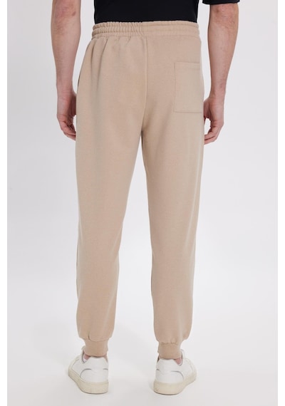 Tudors Erkek Regular Fit Klasik Kesim Beli Bağcıklı Jogger Cepli Lastikli Paça Bej Eşofman Altı-41767 Bej Tudors Erkek Regular Fit Klasik Kesim Beli Bağcıklı Jogger Cepli Lastikli Paça Bej Eşofman Altı-41767 Bej