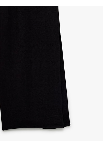 Koton Viskon Kumaş Rahat Kalıp Yırtmaç Detaylı Beli Bağcıklı Cepli Kruvaze Oversize Pantolon Siyah 5sak40462pw Siyah Koton Viskon Kumaş Rahat Kalıp Yırtmaç Detaylı Beli Bağcıklı Cepli Kruvaze Oversize Pantolon Siyah 5sak40462pw Siyah