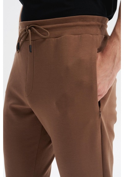 AR-MA Arma Erkek Slim Fit Basic Interlok Dar Paça Eşofman Altı Arka Ve Ön Cepler Gizli Fermuarlı %80 Pamuk %14 Polyester %6 Elastane K30174998802 Açık Kahverengi
