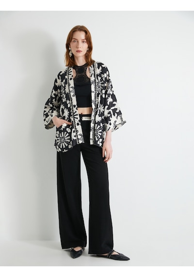 Koton Oversize Kimono Viskon Keten Karışımlı Yarım Kollu Cepli Siyah Desenli 4sak50030ew Beyaz - Siyah Koton Oversize Kimono Viskon Keten Karışımlı Yarım Kollu Cepli Siyah Desenli 4sak50030ew Beyaz - Siyah
