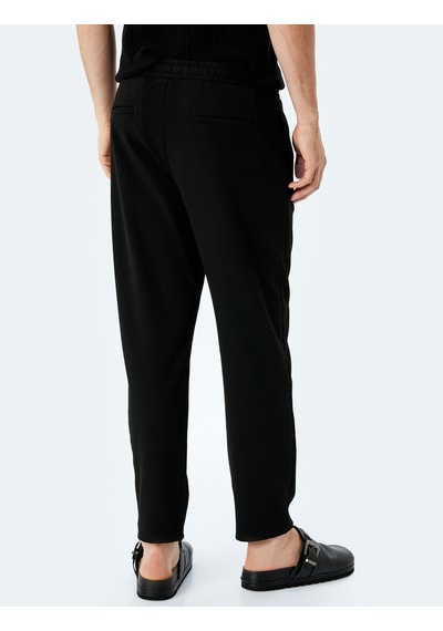 Koton Viskon Karışımlı Cep Detaylı Beli Bağcıklı Eşofman Pantolon Siyah 5sam40088hw Siyah Koton Viskon Karışımlı Cep Detaylı Beli Bağcıklı Eşofman Pantolon Siyah 5sam40088hw Siyah