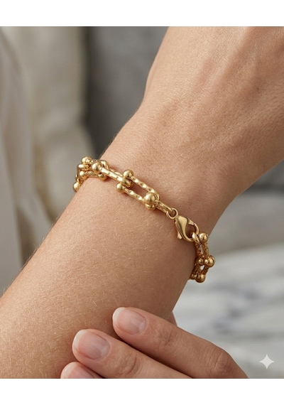 Kadın Birbirine Geçmeli Model Kendinden Desenli Gold Renk Çelik Bileklik