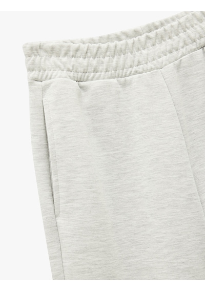 Koton Beli Lastikli Cep Detaylı Rahat Kalıp Geniş Paça Eşofman Altı Kar Melanj 6wak40314nk Gri Melanj Koton Beli Lastikli Cep Detaylı Rahat Kalıp Geniş Paça Eşofman Altı Kar Melanj 6wak40314nk Gri Melanj