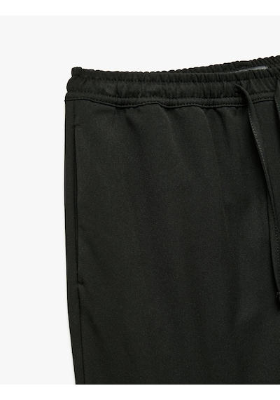 Koton Viskon Karışımlı Cep Detaylı Beli Bağcıklı Pantolon Siyah 6wam40050hw Siyah
