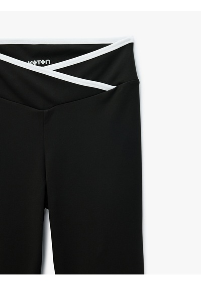 Koton Asimetrik Biyeli Kemer Detaylı Yüksek Bel Slim Fit Spor Tayt Siyah 7wak40117nk