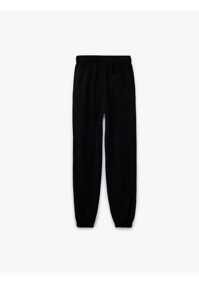 Koton Beli Bağcıklı Viskon Karışımlı Jogger Pantolon Siyah 6skb40120tw Koton Beli Bağcıklı Viskon Karışımlı Jogger Pantolon Siyah 6skb40120tw