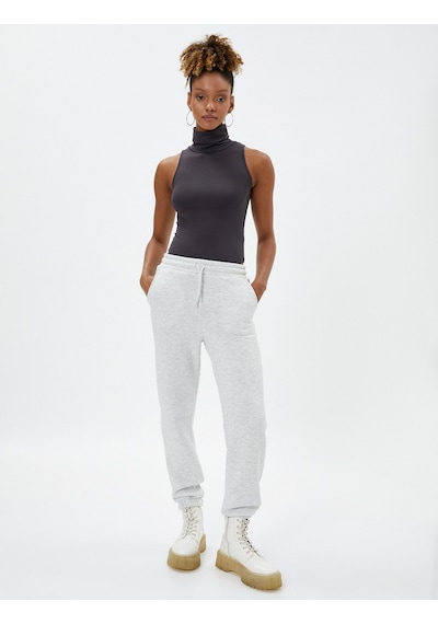 Koton Jogger Eşofman Altı Beli Lastikli Bağcıklı Cep Detaylı Kar Melanj 4wal40002ık 4WAL40002IKKRM Gri Melanj Koton Jogger Eşofman Altı Beli Lastikli Bağcıklı Cep Detaylı Kar Melanj 4wal40002ık 4WAL40002IKKRM Gri Melanj