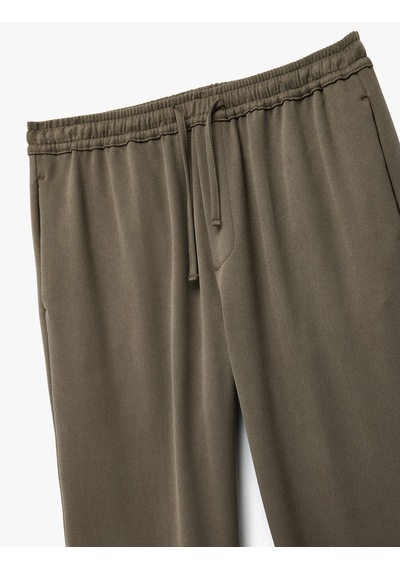 Koton Viskon Karışımlı Cep Detaylı Rahat Kesim Beli Bağcıklı Pantolon Haki 6wam40050hw Haki Koton Viskon Karışımlı Cep Detaylı Rahat Kesim Beli Bağcıklı Pantolon Haki 6wam40050hw Haki
