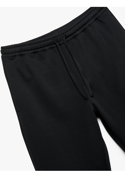 Koton Straight Fit Pike Kumaş Cep Detaylı Rahat Kesim Beli Bağcıklı Pantolon Lacivert 6wam40006hk Lacivert Koton Straight Fit Pike Kumaş Cep Detaylı Rahat Kesim Beli Bağcıklı Pantolon Lacivert 6wam40006hk Lacivert