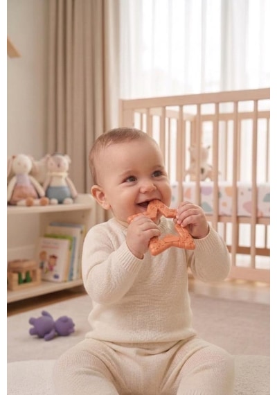 Yıldız Şekilli Esnek Bpa İçermeyen Kabartılı Pastel Renkli Oyuncak Bebek Diş Kaşıyıcısı Turuncu