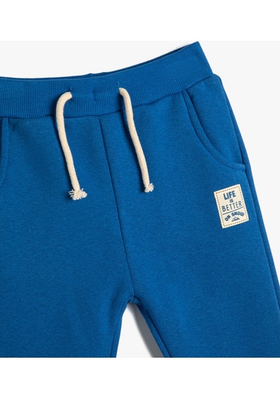 Koton Jogger Eşofman Altı Aplike Detaylı Beli Bağlamalı Şardonlu Mavi 4wmb40158tk 4WMB40158TK601 Mavi