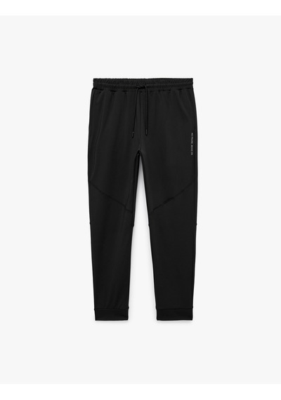 Koton Baskılı Paçası Lastikli Cepli Beli Bağcıklı Jogger Spor Eşofman Altı Siyah 7wam40077nk Koton Baskılı Paçası Lastikli Cepli Beli Bağcıklı Jogger Spor Eşofman Altı Siyah 7wam40077nk