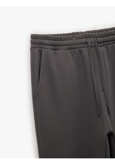 Koton Beli Bağcıklı Şardonlu Cep Detaylı Jogger Kışlık Eşofman Altı Gri 6wam40013mk Gri Koton Beli Bağcıklı Şardonlu Cep Detaylı Jogger Kışlık Eşofman Altı Gri 6wam40013mk Gri
