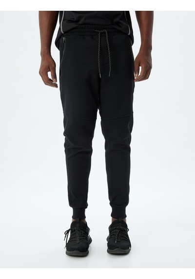 Koton Spor Eşofman Altı Jogger Beli Bağcıklı Dikiş Detaylı Cepli Pamuk Karışımlı Siyah 5wam40095nk Siyah Koton Spor Eşofman Altı Jogger Beli Bağcıklı Dikiş Detaylı Cepli Pamuk Karışımlı Siyah 5wam40095nk Siyah