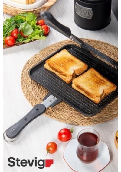 Usta Tostçu Granit Döküm Ocak Üstü El Tost Makinesi St-101 Çıkarılabilen Plakaları Temizliğinizde Kolaylık Sağlayacaktır.