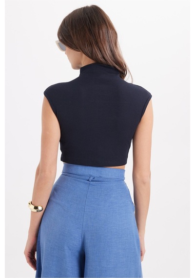 Tudors Kadın Slim Fit Dar Kesim Pamuklu Likralı Dik Yaka Sıfır Kol Yumuşak Dokulu Lacivert Crop Bluz-50466