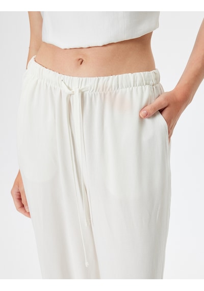 Koton Koton X Sima Tarkan - Keten Karışımlı Bol Paça Pantolon Cepli Beli Bağlamalı Beyaz 4sak40574pw Beyaz Koton Koton X Sima Tarkan - Keten Karışımlı Bol Paça Pantolon Cepli Beli Bağlamalı Beyaz 4sak40574pw Beyaz