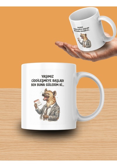 "yaşımız Ciddileşmeye Başladı Ben Buna Gülerim Ki..." Yazılı Gülen Sırtlan Tasarımlı Kupa