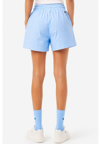 Lacoste X Netflix Women's Monogram Bermuda Shorts Kadın Monogram Hafif Kumaş Bermuda Şort Açık Mavi Lacoste X Netflix Women's Monogram Bermuda Shorts Kadın Monogram Hafif Kumaş Bermuda Şort Açık Mavi
