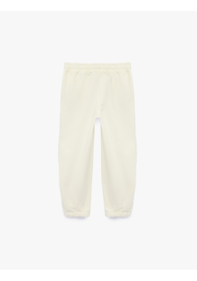 Koton Cep Detaylı Lastikli Oversize Jogger Eşofman Altı Ekru 7wmb40044tk