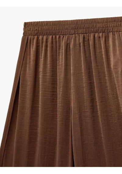 Koton Aerobin Kumaş Beli Lastikli Yırtmaçlı Asimetrik Kesim Saten Harem Pantolon Kahverengi 6sak40098pw Kahve