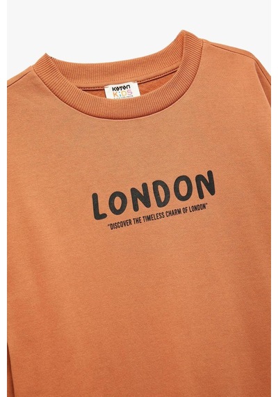 Koton Erkek Çocuk Pamuklu Uzun Kollu Bisiklet Yaka Baskılı Şardonlu Oversize Sweatshirt Kiremit Koton Erkek Çocuk Pamuklu Uzun Kollu Bisiklet Yaka Baskılı Şardonlu Oversize Sweatshirt Kiremit