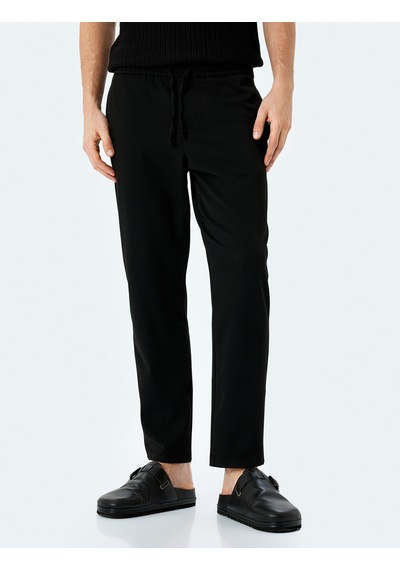 Koton Viskon Karışımlı Cep Detaylı Beli Bağcıklı Eşofman Pantolon Siyah 5sam40088hw Siyah Koton Viskon Karışımlı Cep Detaylı Beli Bağcıklı Eşofman Pantolon Siyah 5sam40088hw Siyah