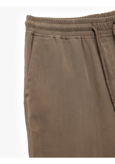 Koton Viskon Cep Detaylı Rayon Tapered Beli Bağcıklı Yazlık Pantolon Kahverengi 5sam40010hw Kahve