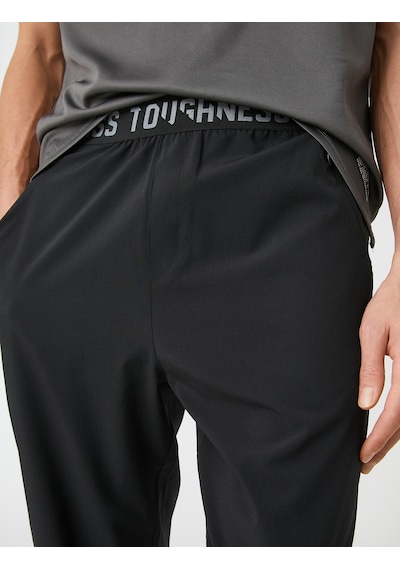 Koton Spor Eşofman Altı Beli Lastikli Slogan Detaylı Cepli Paraşüt Kumaş Siyah 3wam40003nw Koton Spor Eşofman Altı Beli Lastikli Slogan Detaylı Cepli Paraşüt Kumaş Siyah 3wam40003nw