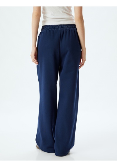 Koton Oversize Eşofman Altı Bol Paça Beli Lastikli Biyeli Cepli Lacivert 5wal40062ık Lacivert Koton Oversize Eşofman Altı Bol Paça Beli Lastikli Biyeli Cepli Lacivert 5wal40062ık Lacivert