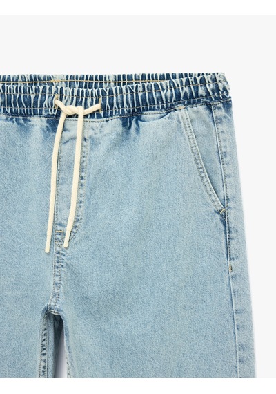 Koton Pamuklu Cepli Oversize Beli Bağcıklı Jean Pantolon Açık İndigo 6sam40431nd Koton Pamuklu Cepli Oversize Beli Bağcıklı Jean Pantolon Açık İndigo 6sam40431nd