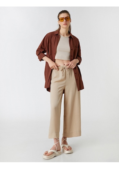 Koton Crop Pantolon Bol Paça Beli Bağlamalı Saten Görünümlü Taş 2sak40119pw Taş