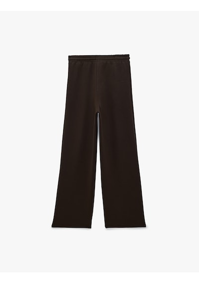 Koton Rahat Kalıp Modal Kumaş Beli Bağcıklı Pileli Detaylı Geniş Paça Eşofman Altı Kahverengi 7wak30094ek Kahve Koton Rahat Kalıp Modal Kumaş Beli Bağcıklı Pileli Detaylı Geniş Paça Eşofman Altı Kahverengi 7wak30094ek Kahve