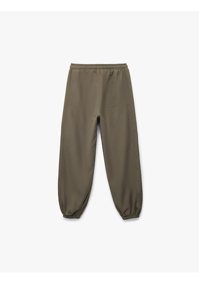 Koton Cepli Beli Lastikli Bağlamalı Loose Fit Jogger Paraşüt Pantolon Yeşil 6wkb40018tw Yeşil Koton Cepli Beli Lastikli Bağlamalı Loose Fit Jogger Paraşüt Pantolon Yeşil 6wkb40018tw Yeşil