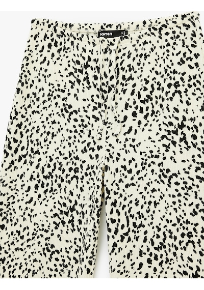 Koton Bürümcük Kumaş Beli Bağcıklı Geniş Paça Bol Pantolon Siyah Desenli 6sak40059ek Siyah Desenli Koton Bürümcük Kumaş Beli Bağcıklı Geniş Paça Bol Pantolon Siyah Desenli 6sak40059ek Siyah Desenli