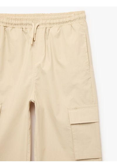 Koton Pamuklu Kapaklı Cep Detaylı Beli Bağcıklı Oversize Jogger Pantolon Bej 6skb40069tw Ekru