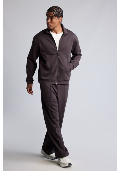Defacto Ultra Yumuşak Baggy Fit Elastik Bel Ön Dikiş Detaylı Dalgıç Kumaş Jogger Pantolon H6171ax26aubn338 Kahve-bn338