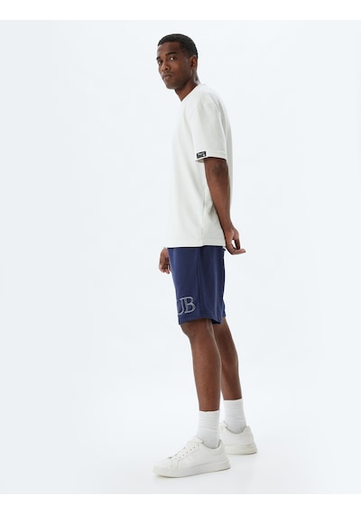 Koton Spor Şort Oversize Slogan Baskılı Cep Detaylı Pamuk Karışımlı Lacivert 4sam40094nk Lacivert