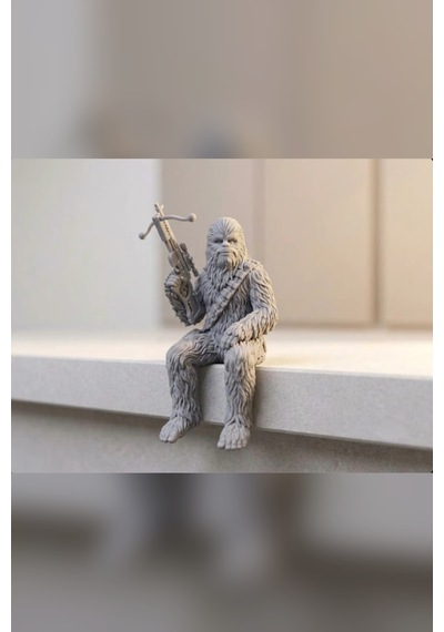Zeroxo Oturan Tüylü Yaratık Figürü Silahlı Biblo 10x8 Cm