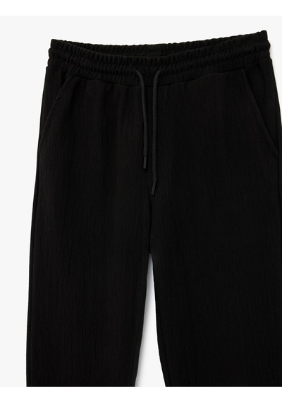 Koton Normal Paça Regular Fit Cepli Dokulu Beli Bağcıklı Eşofman Altı Siyah 6sam40042mk Siyah Koton Normal Paça Regular Fit Cepli Dokulu Beli Bağcıklı Eşofman Altı Siyah 6sam40042mk Siyah